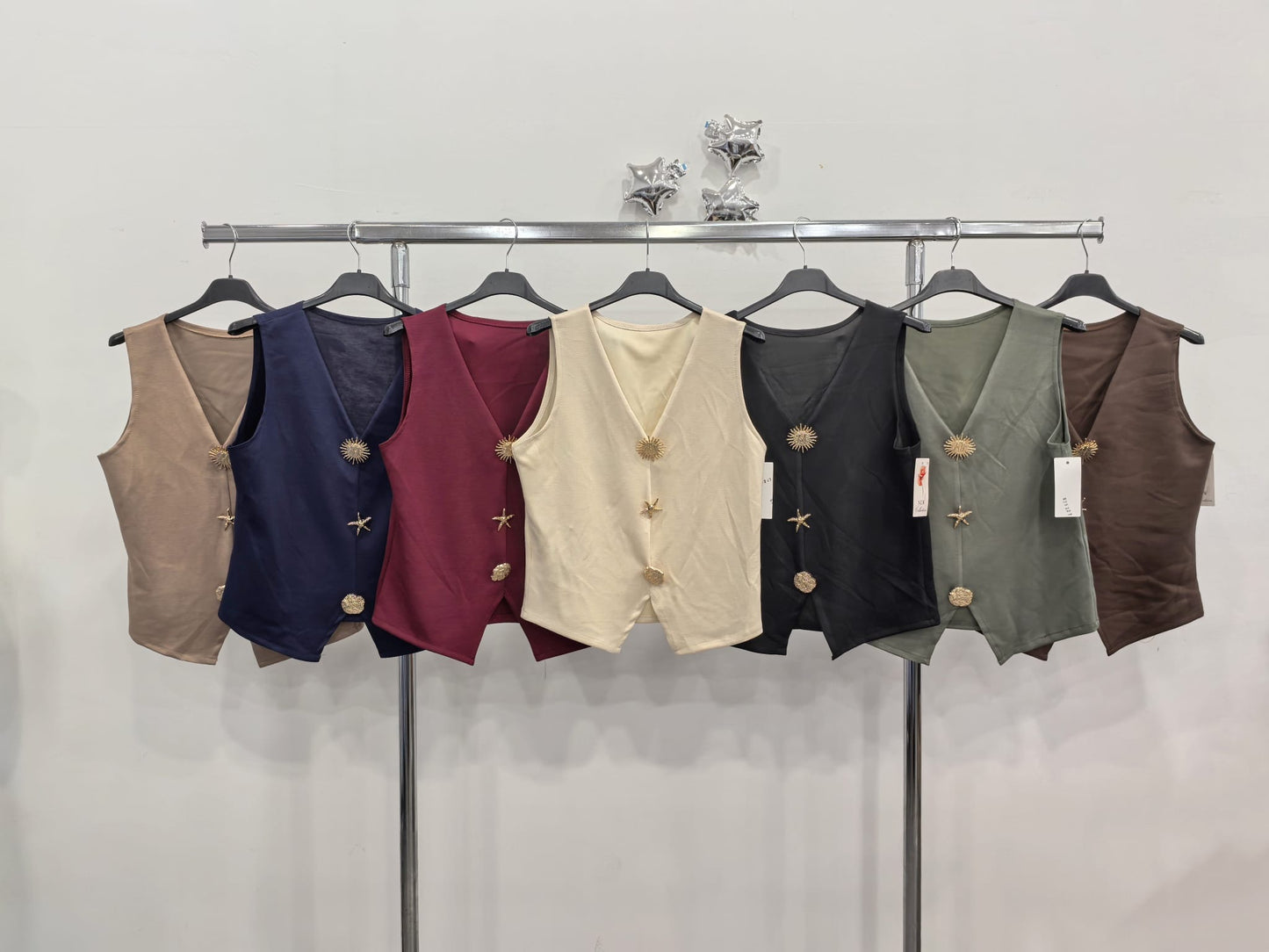 Chaleco broches